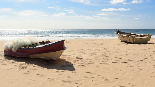 two sail boats on seashore thumbnail