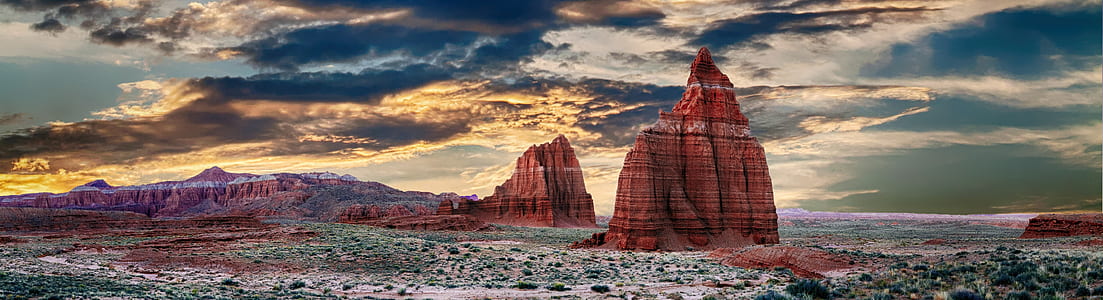 brown rock formation during golden hour thumbnail