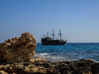 brown boat sailing in the ocean thumbnail