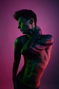 man with arm tattoo photo thumbnail