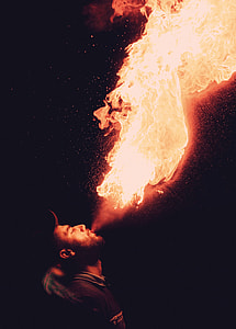 man blowing fire thumbnail