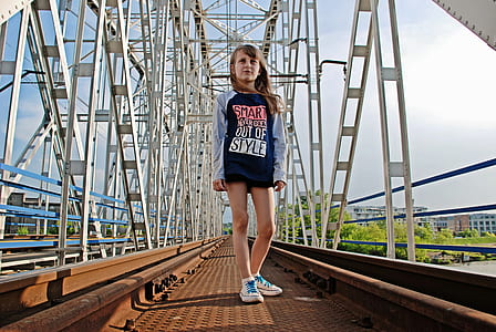 girl stand in train road thumbnail