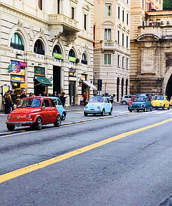 five assorted-color FIAT 500 on road thumbnail