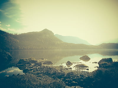 mountain beside body of water thumbnail