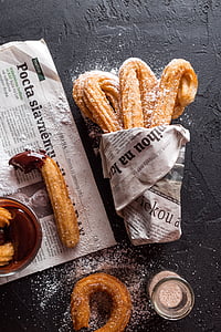baked bread food coated with newspaper thumbnail