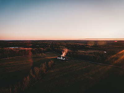 aerial view photography of white house surrounded by trees thumbnail