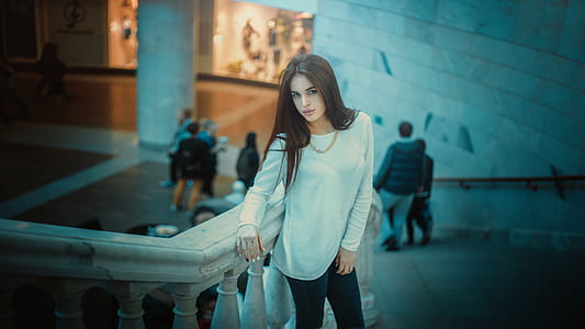 woman in white long-sleeved top thumbnail