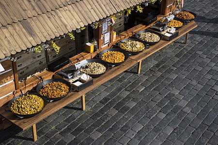 high-angle photography of bowl of foods on brown table thumbnail