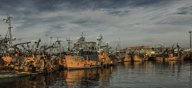 orange ship on ocean thumbnail