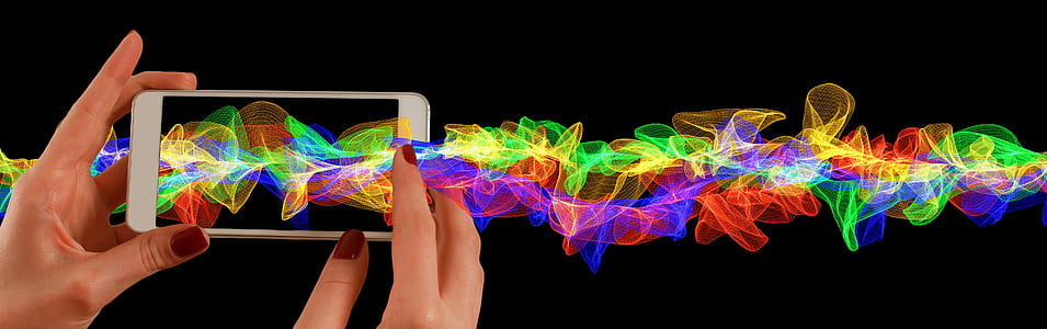 smartphone taking photograph of multicolored line thumbnail