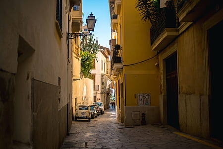 vehicles park on alley thumbnail