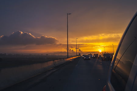 vehicles on blacktop bridge thumbnail