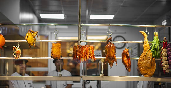 Photo of Assorted Food Hanging on Gray Metal Railings thumbnail