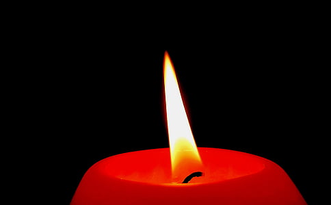 time lapse photography of lighted candle thumbnail