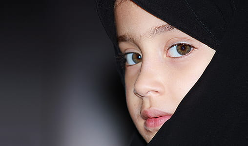 girl wearing black hijab headdress thumbnail