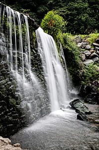 water falls during daytime thumbnail