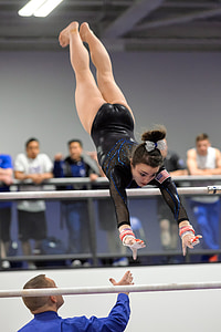 woman performing gymnastic front of people thumbnail