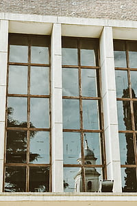 clear glass window pane between white post thumbnail