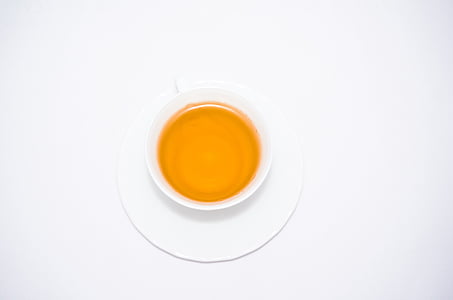 white cup with tea thumbnail