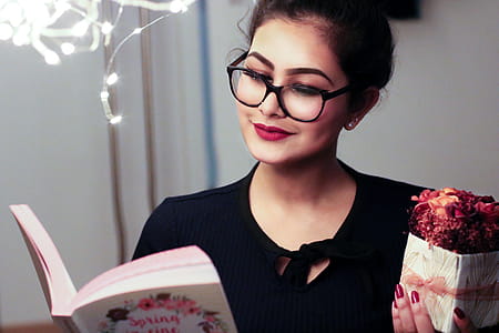 Woman Holding Book thumbnail