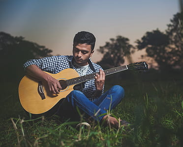 man playing acoustic guitar thumbnail