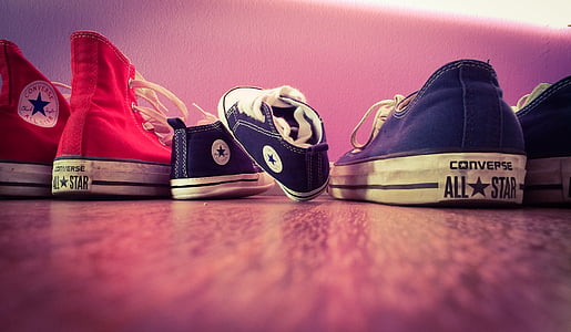 close-up photo of three assorted-color Converse All-Star shoes thumbnail