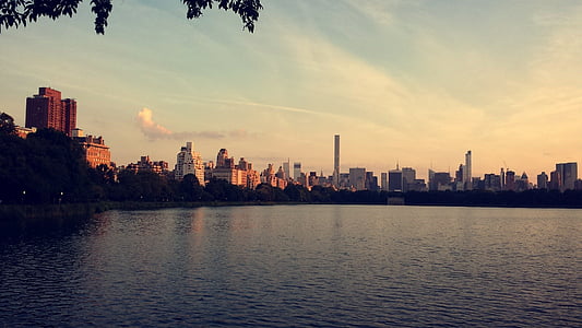 city buildings and body of water during daytime thumbnail