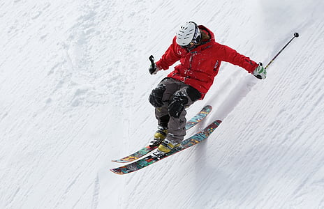 man playing skis on snow thumbnail