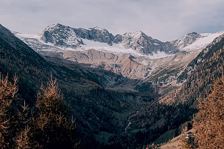 view of brown rocky and alp mountains thumbnail