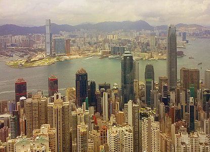 city skyline near sea aerial photography thumbnail