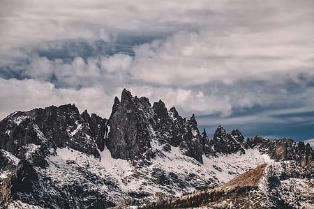 mountain covered with snow during daytime thumbnail