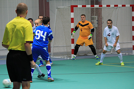 soccer player playing inside gym thumbnail