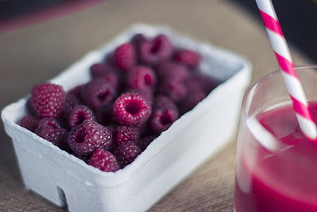 red fruits serving on white ceramic bowl thumbnail