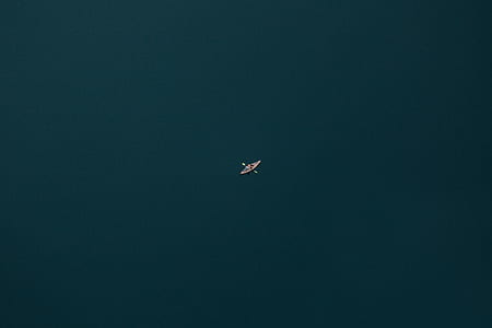 high angle photography of brown boat thumbnail