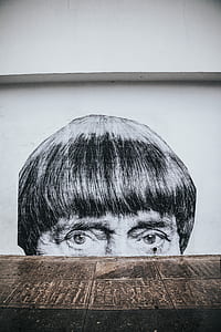 man's portrait on wall thumbnail