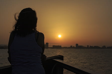 woman looking at city thumbnail