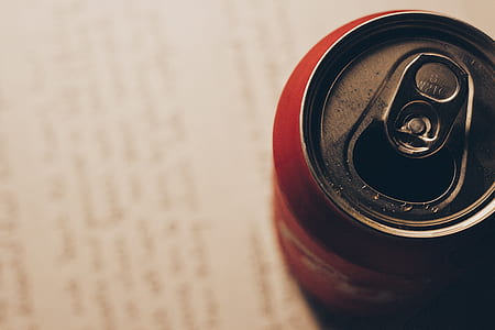 red soda can on white printer paper thumbnail