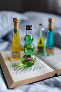 Group of colorful little bottles with liqueurs thumbnail