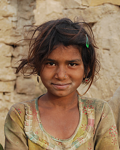tilt shift lens photo of girl wearing shirt thumbnail