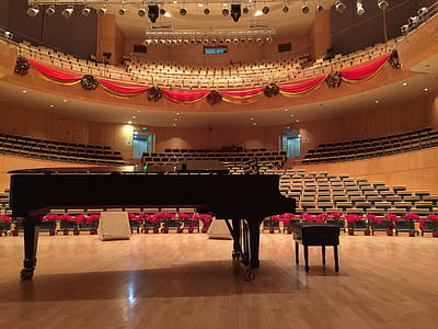 black grand piano on stage thumbnail