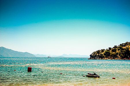 personal watercraft on body of water at daytime thumbnail