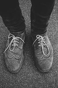 Low Section of Man Wearing Shoes thumbnail