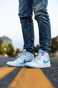 person standing on aslphalt road thumbnail