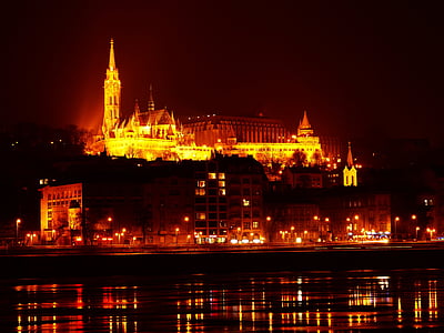 aerial photography of castle at night time thumbnail
