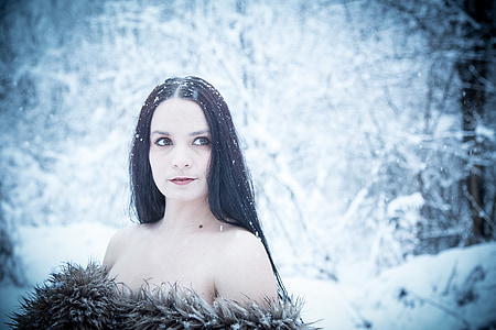 woman wearing black fur top on snow season thumbnail