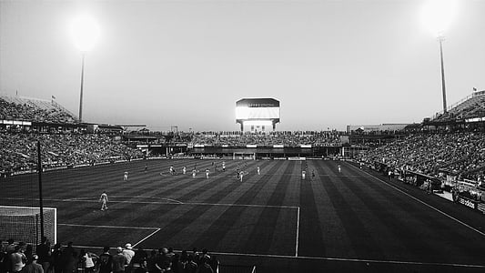 grayscale photo of people watching soccer league thumbnail