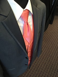 men's black suit jacket, pink waistcoat with pink necktie and white dress shirt thumbnail