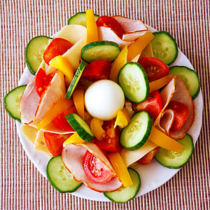 assorted sliced vegetables served on saucer thumbnail