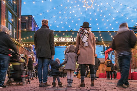 Family Holding Hands In Winter Photo thumbnail