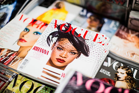 pile of assorted Vogue magazine thumbnail